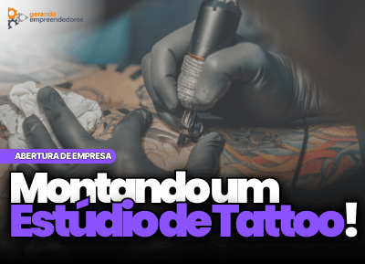 Como abrir um estúdio de tatuagem - homem tatuando uma pessoa em um estúdio de tatuagem